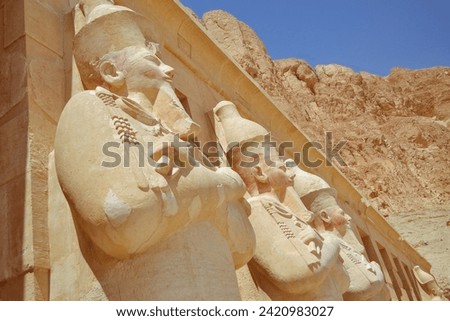 the Temple of Ramses III at Medinet Habu doesn’t get as much airtime as Karnak Temple and Luxor Temple, it’s most definitely worth seeing. While smaller, this temple has some of the most vividly color Royalty-Free Stock Photo #2420983027