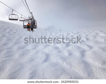 Winter mountains and skiing in Les Contamines Montjoie, French alps.