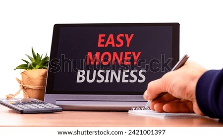Easy money business symbol. Concept words Easy money business on beautiful tablet screen. Beautiful wooden table white background. Businessman hand. Easy money business concept. Copy space.