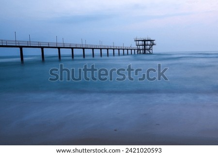 Iconic fishing bridge at Arabian sea in kuwait  along with very good clouds in early morning time
