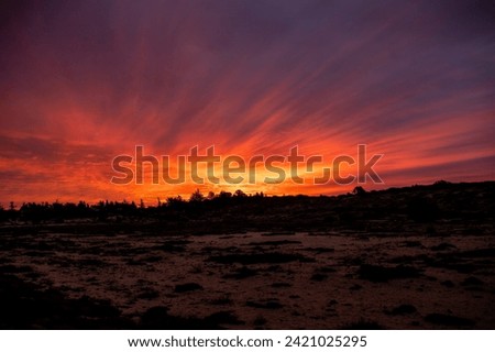 Colorful sunrise skies with rays of Blues and pinks