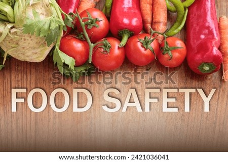 food safety text and A alot of vegetable (Tomato, green pepper, red capia pepper, carrot, celery root). social issue creative photo