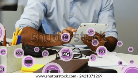Image of 5g texts over african american man using tablet. Global business and digital interface concept digitally generated image.