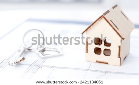 the keys to the house on the contract for the purchase of a house or apartment. High quality photo