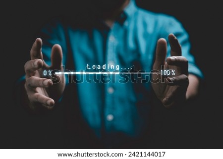 Digital loading bar progress from 0% to 100% between businessman hands for information download data concept. Royalty-Free Stock Photo #2421144017