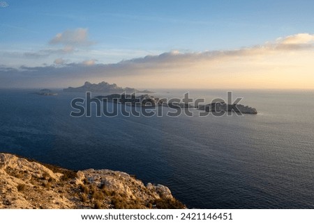 Panorama of the Riou Archipelago in Marseille, France, by sunset. Picture taken from the Callelongue Calanque. Jarre island, Calseraigne Island and Riou Island.