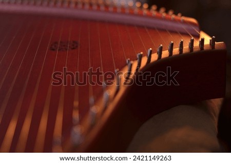 Gusli (national slavic harp), slavic psaltery Royalty-Free Stock Photo #2421149263