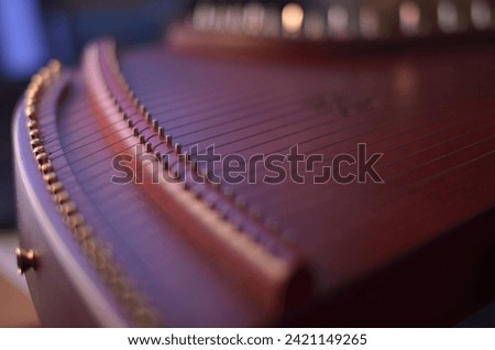 Gusli (national slavic harp), slavic psaltery Royalty-Free Stock Photo #2421149265