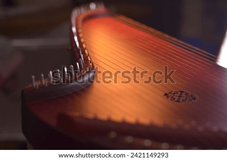 Gusli (national slavic harp), slavic psaltery Royalty-Free Stock Photo #2421149293