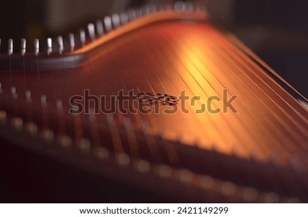 Gusli (national slavic harp), slavic psaltery Royalty-Free Stock Photo #2421149299
