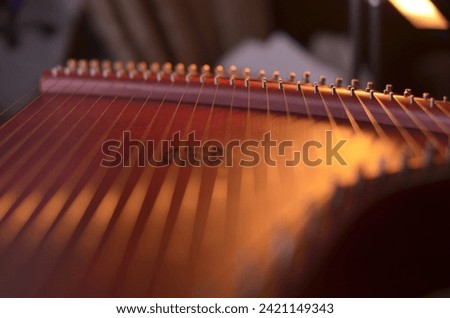Gusli (national slavic harp), slavic psaltery Royalty-Free Stock Photo #2421149343