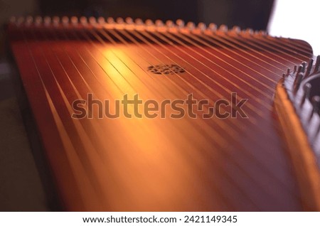 Gusli (national slavic harp), slavic psaltery Royalty-Free Stock Photo #2421149345
