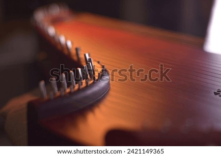 Gusli (national slavic harp), slavic psaltery Royalty-Free Stock Photo #2421149365