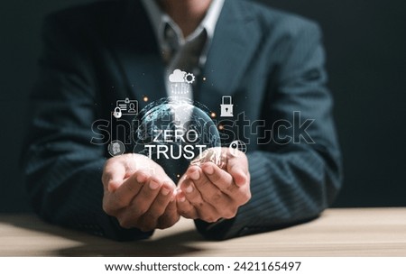 Zero trust security concept, Businessman holding virtual zero trust icon for business information security network. Royalty-Free Stock Photo #2421165497