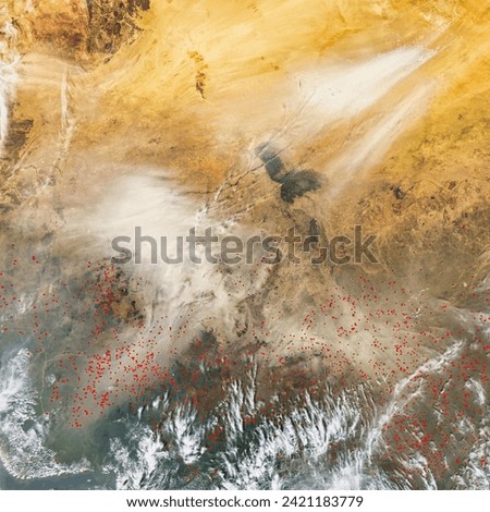 Dust and Smoke near Lake Chad. . Elements of this image furnished by NASA.