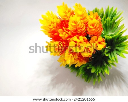 Yellow and green paper flowers become decorations in the house