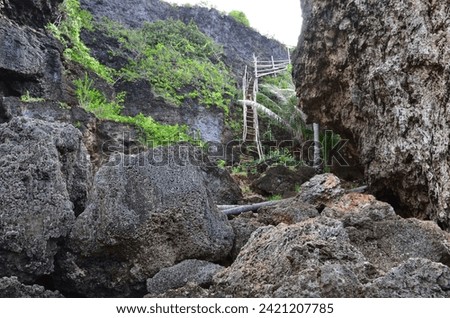 Dangerous path leading down to a bathing area, Siquijor island Royalty-Free Stock Photo #2421207785