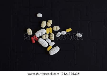  A tablet or pill is a pharmaceutical oral dosage form (oral solid dosage, or OSD)or solid unit dosage form. Tablets may be defined as the solid unit dosage form of medication with suitable excipients Royalty-Free Stock Photo #2421325335
