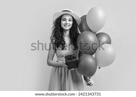 birthday woman hold gift balloons in studio. birthday woman with gift balloons