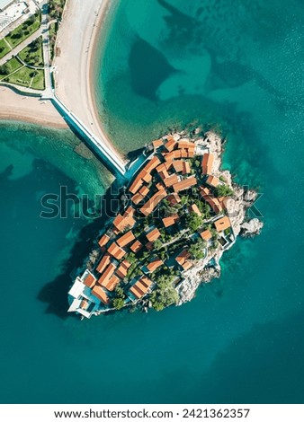 Aerial View of Peninsula with Red Roofed Buildings Royalty-Free Stock Photo #2421362357