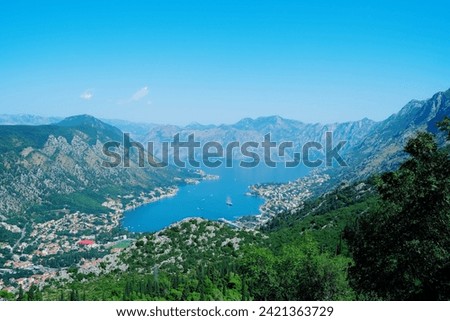 Kotor and the Bay of Kotor, taken from the top from Lovcen. Shot in summer, when a cruise ship was entering the harbour