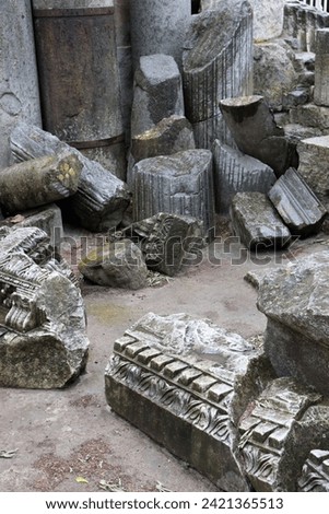 Stones and columns of the ruins of the Roman Theater in Arles, Provence, France