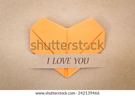 Valentine card, The heart shape paper on brown with "I love you" label