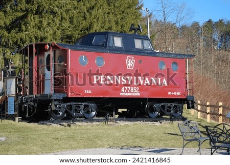 Pennsylvania Railroad Caboose On Display  Royalty-Free Stock Photo #2421416845