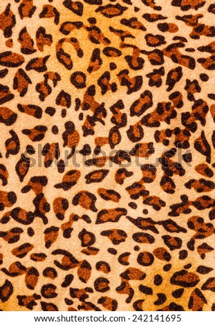 Tiger print fabric close  up background.