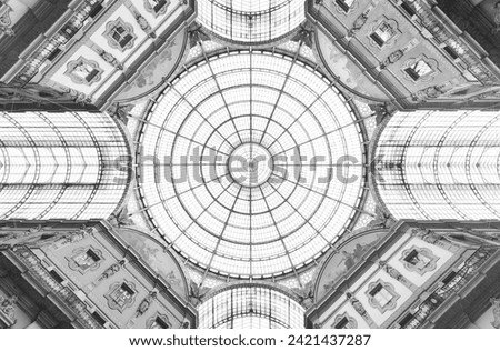Interior view of glass dome of Galleria Vittorio Emanuele in Milan, Italy Royalty-Free Stock Photo #2421437287