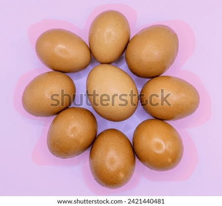 A picture filled with simplicity and freshness, fresh eggs arranged impeccably on a white background, prepared for the celebration of Easter. The vibrant colors and their perfectly round shape bring 