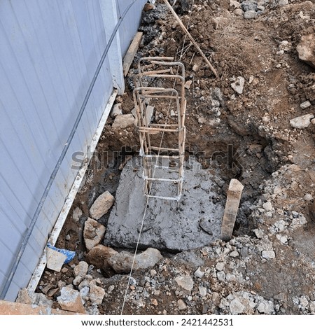 Concrete Foundation or footplat with reinforcement Royalty-Free Stock Photo #2421442531