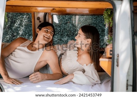 Portrait of a caucasian couple loving at home or hotel room together laughing and having fun. Happiness and joyful expression man and a woman Lovers celebrating Valentine's Day.