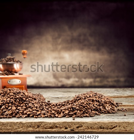 brown background and mill of coffee 