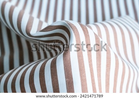 Brown stripe line, texture background, fabric texture, textile pattern, curvy texture background, realistic, close up photography, abstract background