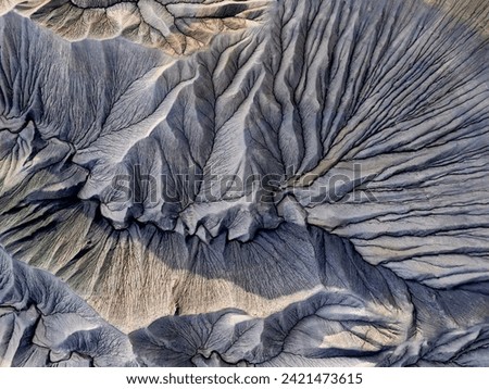 Alluvial fans and hills drone photography. Eroded desert from above. Factory Butte. Capitol Reef. Moab. Utah. USA