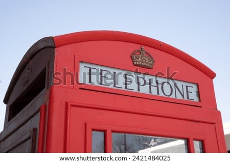 Old Red Telephone sign text and brand logo Booth London phone box