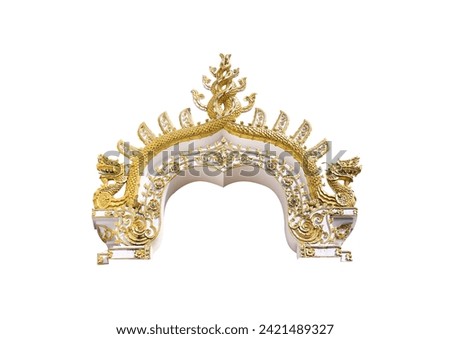 Gold yellow gable arches  carving stucco in Thai temple with  naga king statue patterns  isolated on white background , clipping path Royalty-Free Stock Photo #2421489327