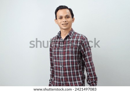 Happy asian indonesian man smile. on isolated background
