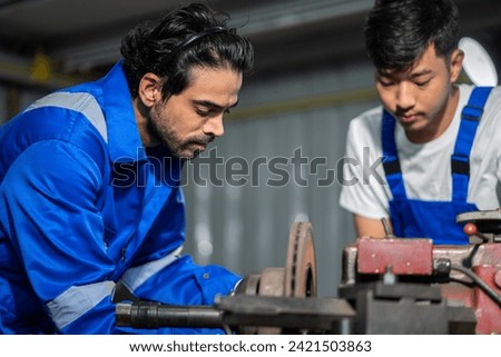 Professional team labor machanic engineer technician worker industrial work control with machine, manufacturing, factory, production line, Indusry 4.0, robot, industrial facility.business planning