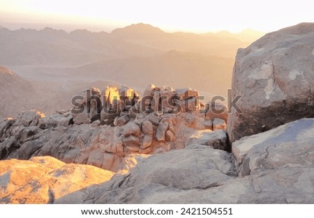 The beautiful Egyptian Sinai Peninsula with yellow sand, desert, plateaus and high and magnificent mountains, which is located on the borders with Palestine and Gaza, which contains the Suez Canal Royalty-Free Stock Photo #2421504551