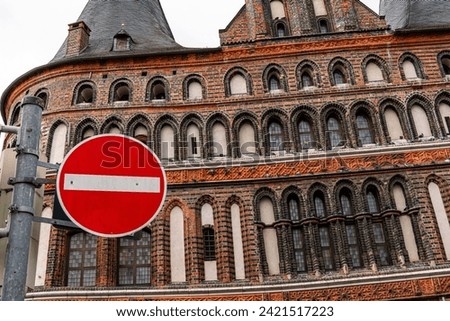 Stop sign in front of the "Holstentor" in "Lübeck" Germany
