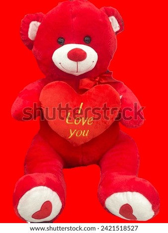 Red Teddy Bear with written I love You with jointed hearts  cute Teddy love symbol for February valentines special presents Red Background