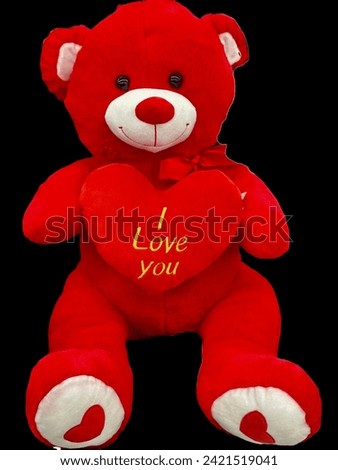 Red Teddy Bear with written I love You with jointed hearts  cute Teddy love symbol for February valentines special presents black background