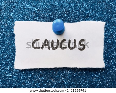 Caucus writting on blue  background. Royalty-Free Stock Photo #2421556941
