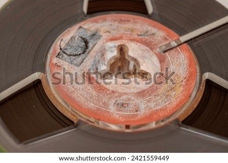 Vintage reel tape recorder close view Royalty-Free Stock Photo #2421559449