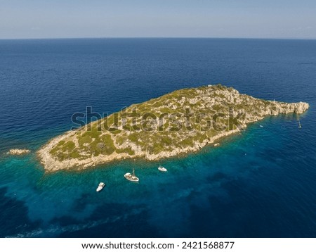 Aerial drone photo of Agios Nikolaos - a small port on the island of Zante. Vardiola of Agios Nikolaos on island in Greece, Zakynthos.