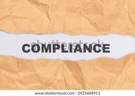 Ripped paper with compliance text over a white background. Compliance concept 