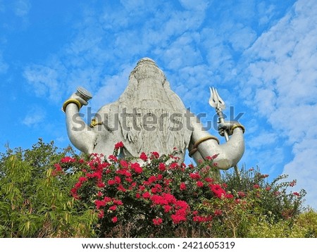 Rear view of Lord Shiva Statue in Murdeshwar  Royalty-Free Stock Photo #2421605319