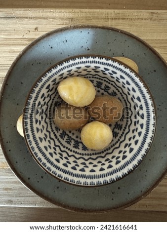 Easter. Eastereggs in a bowl Royalty-Free Stock Photo #2421616641